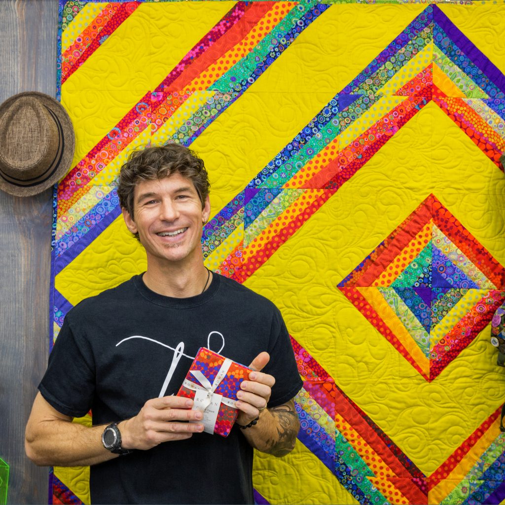 String Quilt – Man Sewing